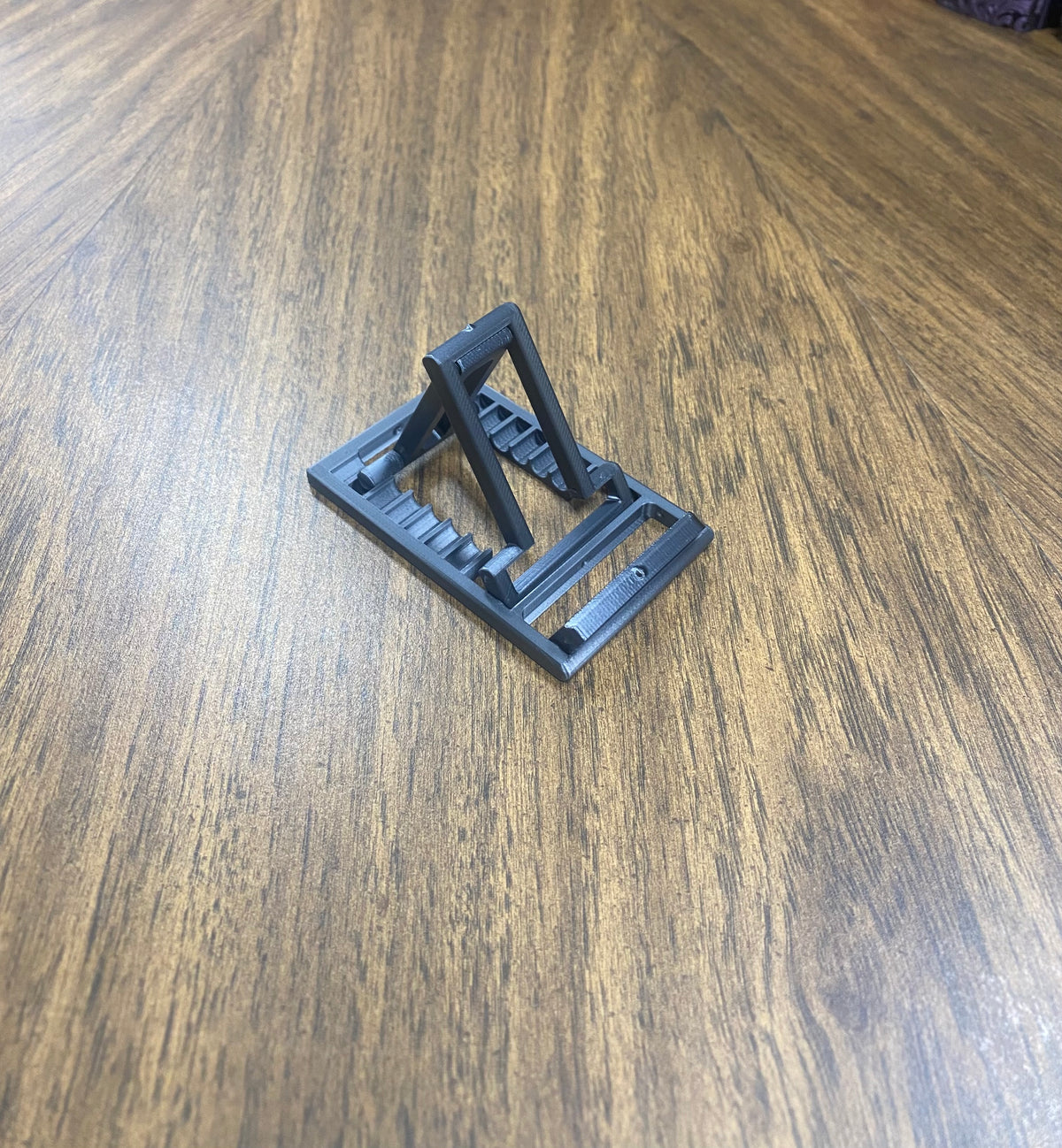 Cell Phone Stand: Collapsible Travel Desk Accessory Ultra Slim Holder
