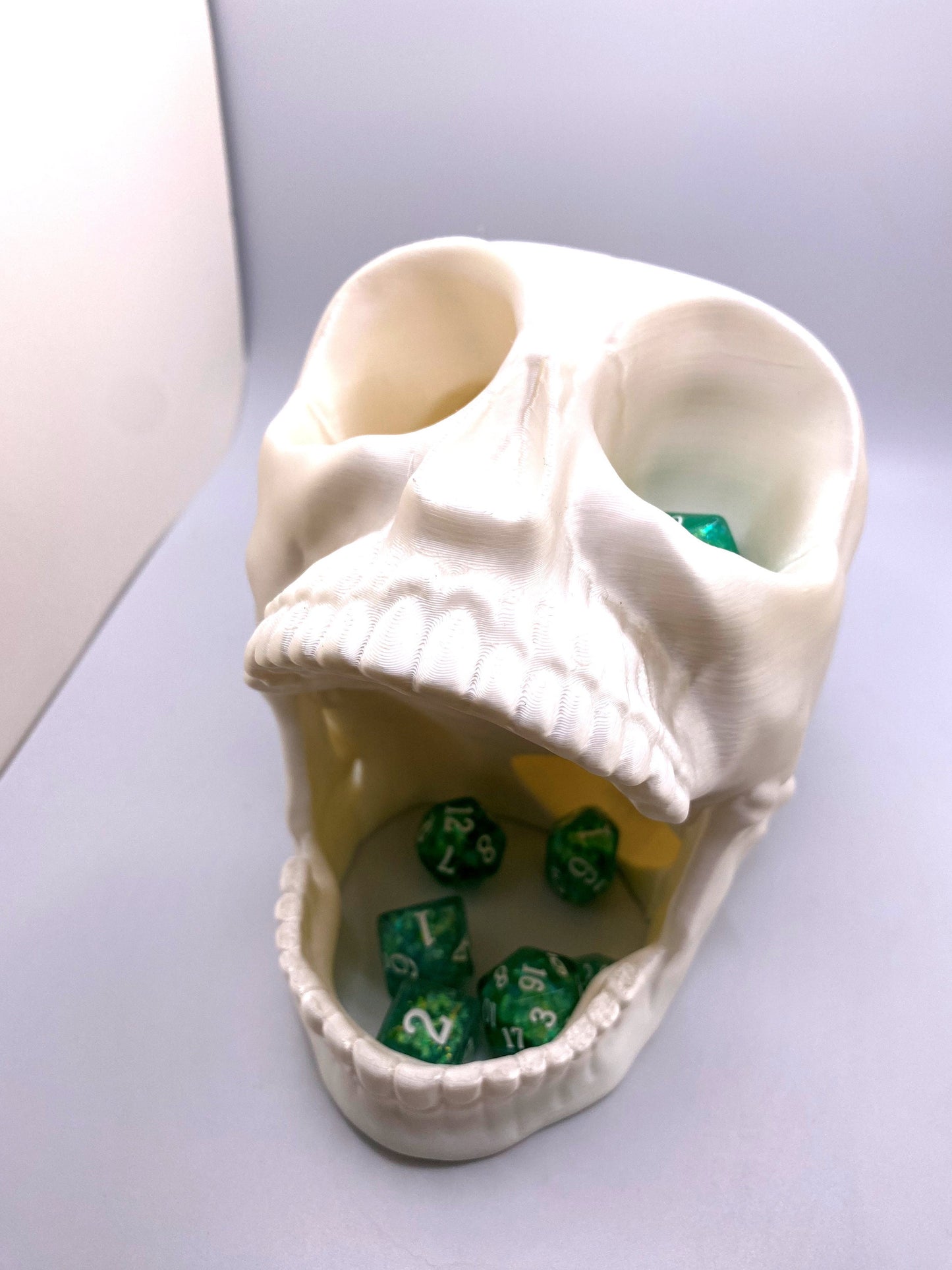 Screaming Skull Dice Tower haunting dice-rolling accessories for various games like Dungeons and Dragons, MTG, Risk, or other Dice games.